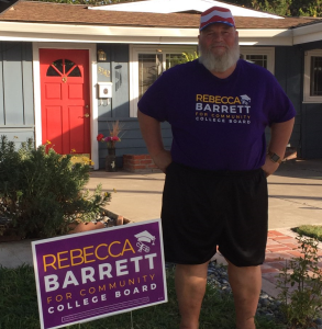 Image of me standing in front of Bec's campaign sign